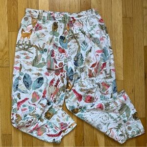 Anthropologie White Jogger Pants with Multicolor Floral & Wildlife Print